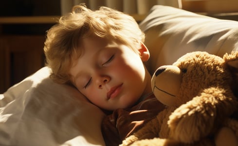 close-up-boy-sleeping-with-teddy-bear